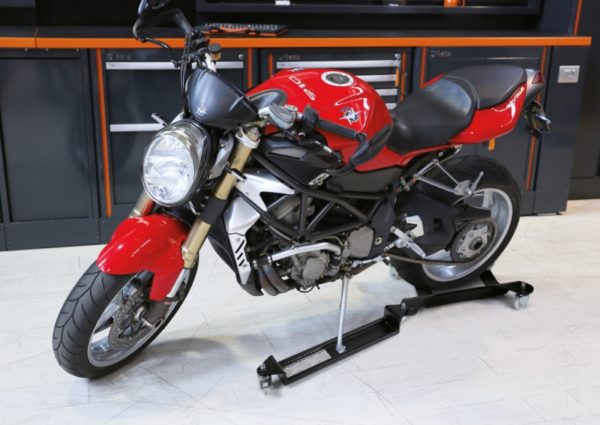 Moving base for central stand or motorcycle rear wheel with extension for side stand - Image 2